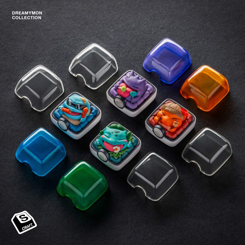 Close-up of Pokémon-themed artisan keycaps featuring colorful designs like Pikachu, Charmander, Bulbasaur, and Gengar, adding a personalized touch to a mechanical keyboard.